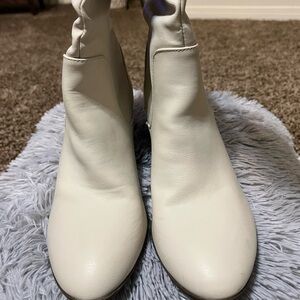 NWT Cream color mid shaft cone shape heel boots.